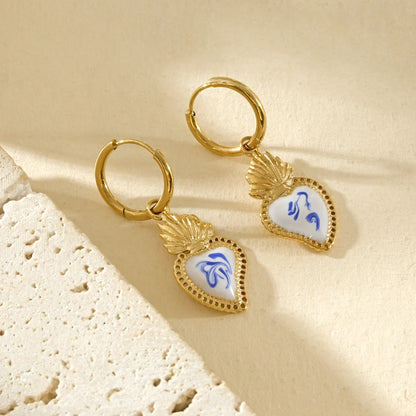 Goudkleurige Oorbellen met Hart Hanger | TWINOLO