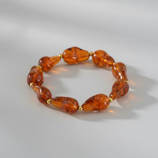 Dames Elastische Resin Armband – Amber Bruin – Trendy Kralenarmband | Twinolo