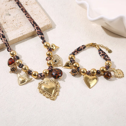 Boho Dames Ketting met Bedels – Luipaardkoord & Goudkleurig RVS – Statement Ketting | Twinolo
