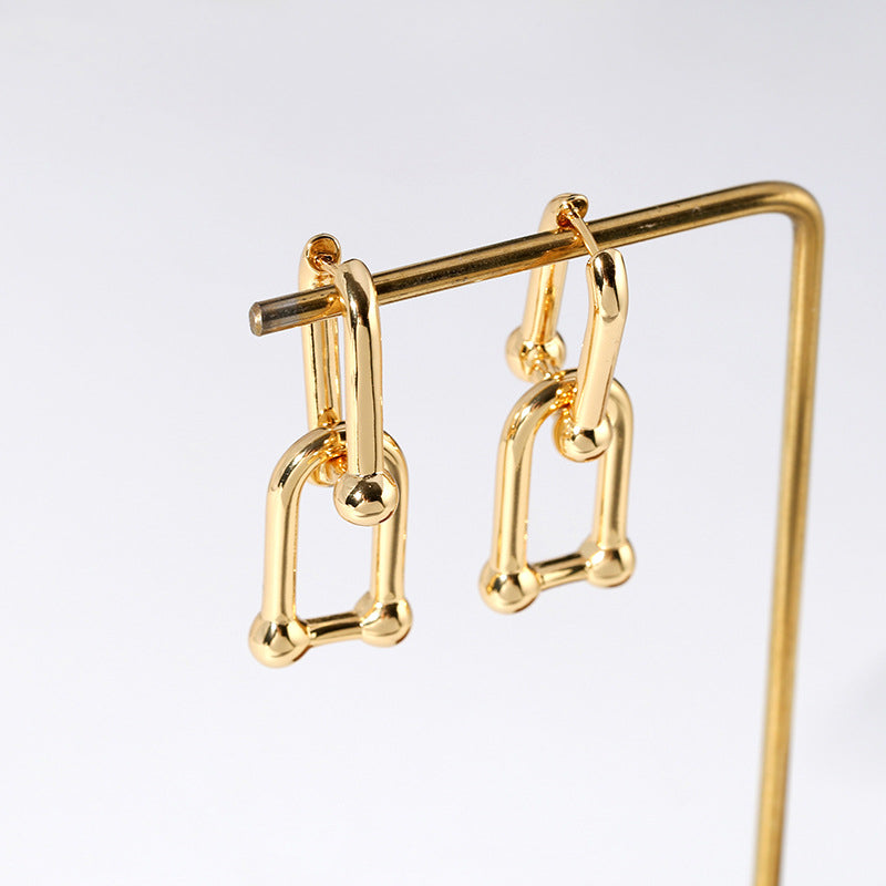 Gouden Oorbellen met Schakelketting – Stoer & Stijlvol | Twinolo