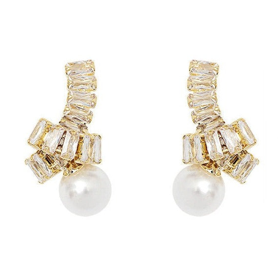 Boucles d'oreilles avec perle – Uniques et élégantes | Twinolo