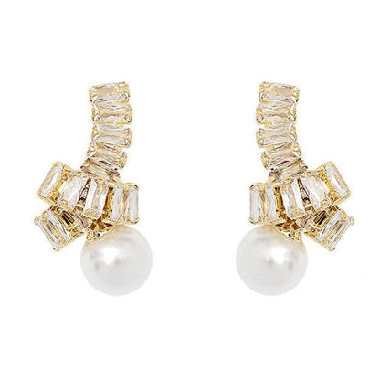 Boucles d'oreilles avec perle – Uniques et élégantes | Twinolo