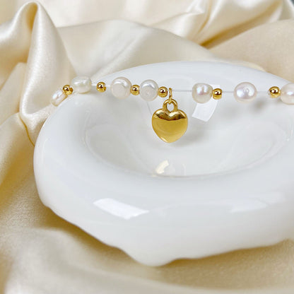 Bracelet de perles d'eau douce avec breloque cœur | Twinolo