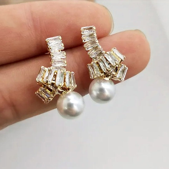 Boucles d'oreilles avec perle – Uniques et élégantes | Twinolo